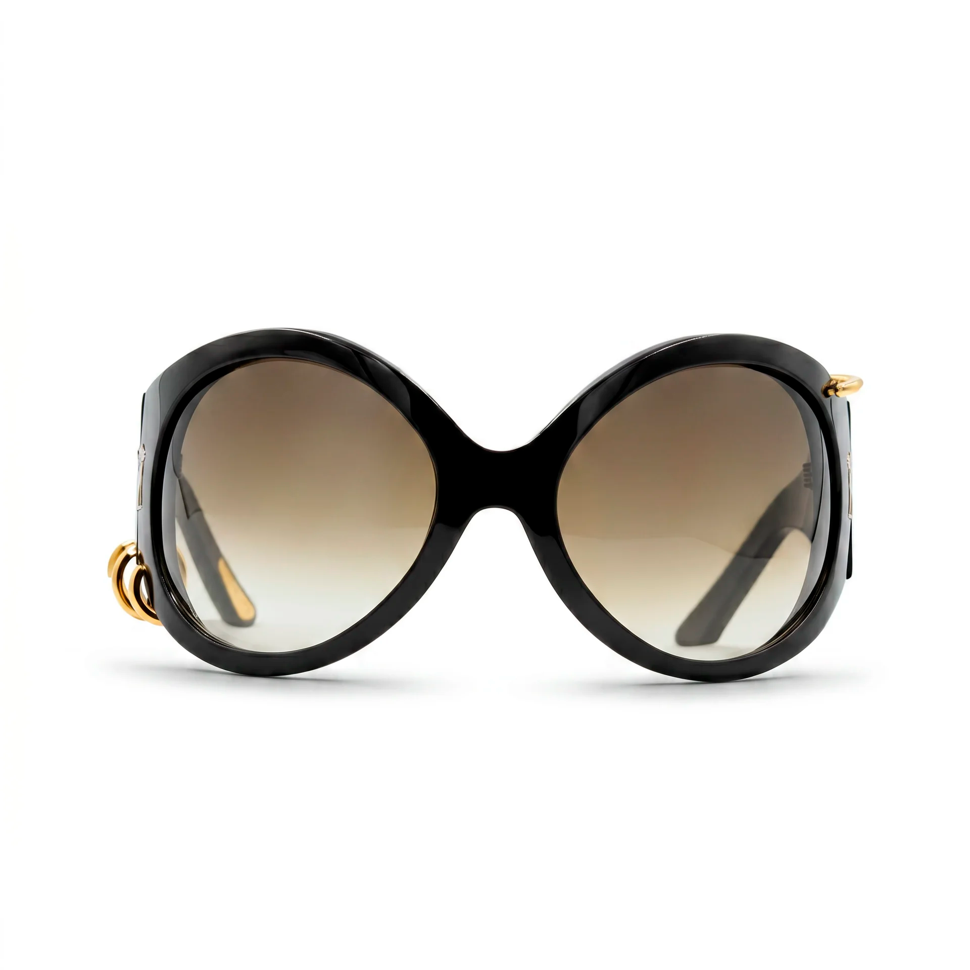Black sunglasses with gold accents on a white background